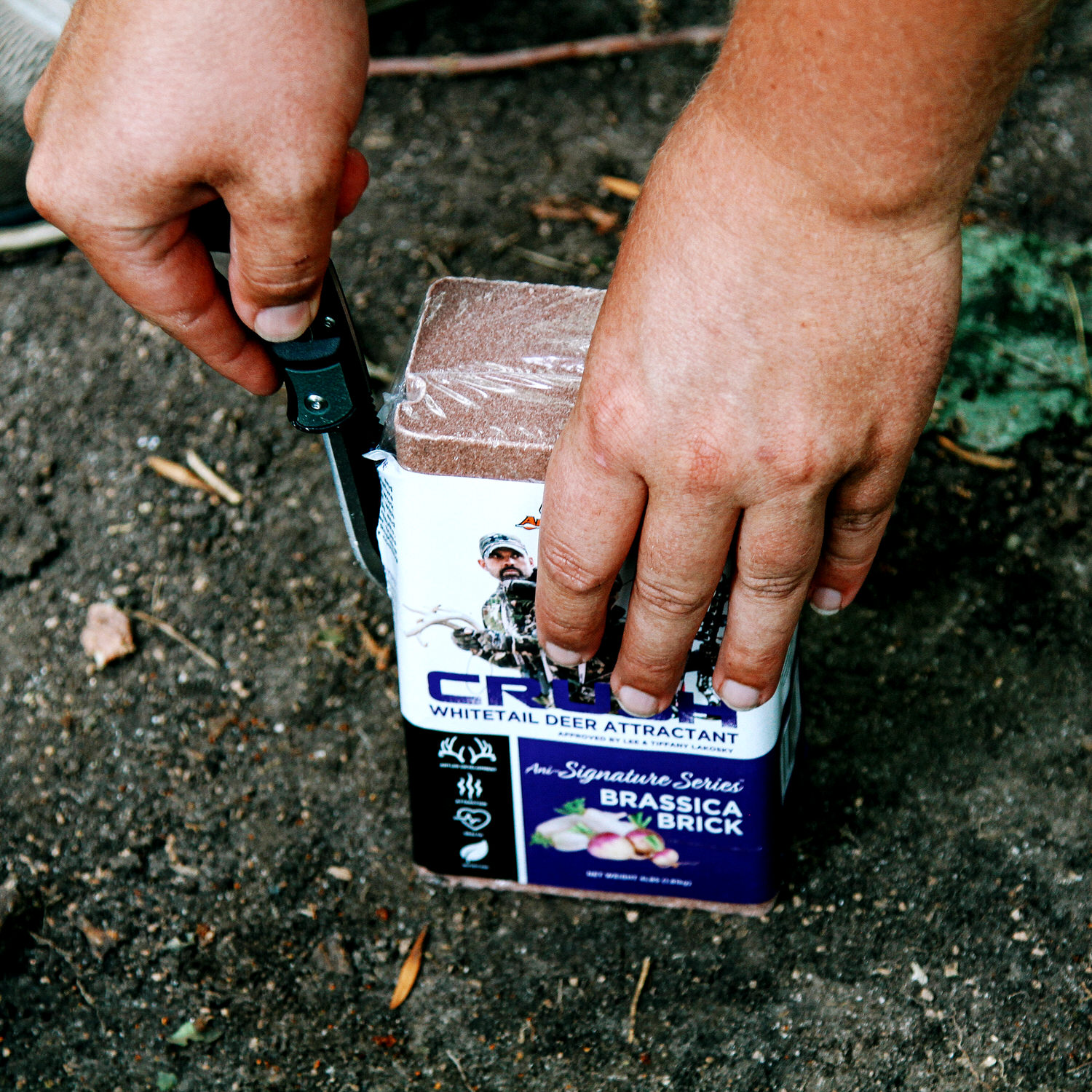 Man opening a CRUSH Brassica Brick