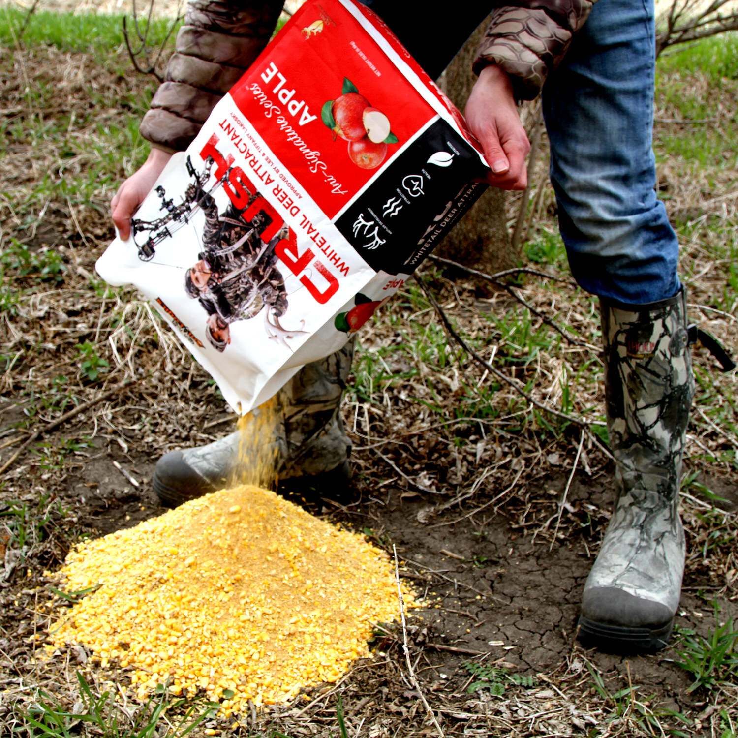 Bag of CRUSH Apple Granular being poured onto the ground