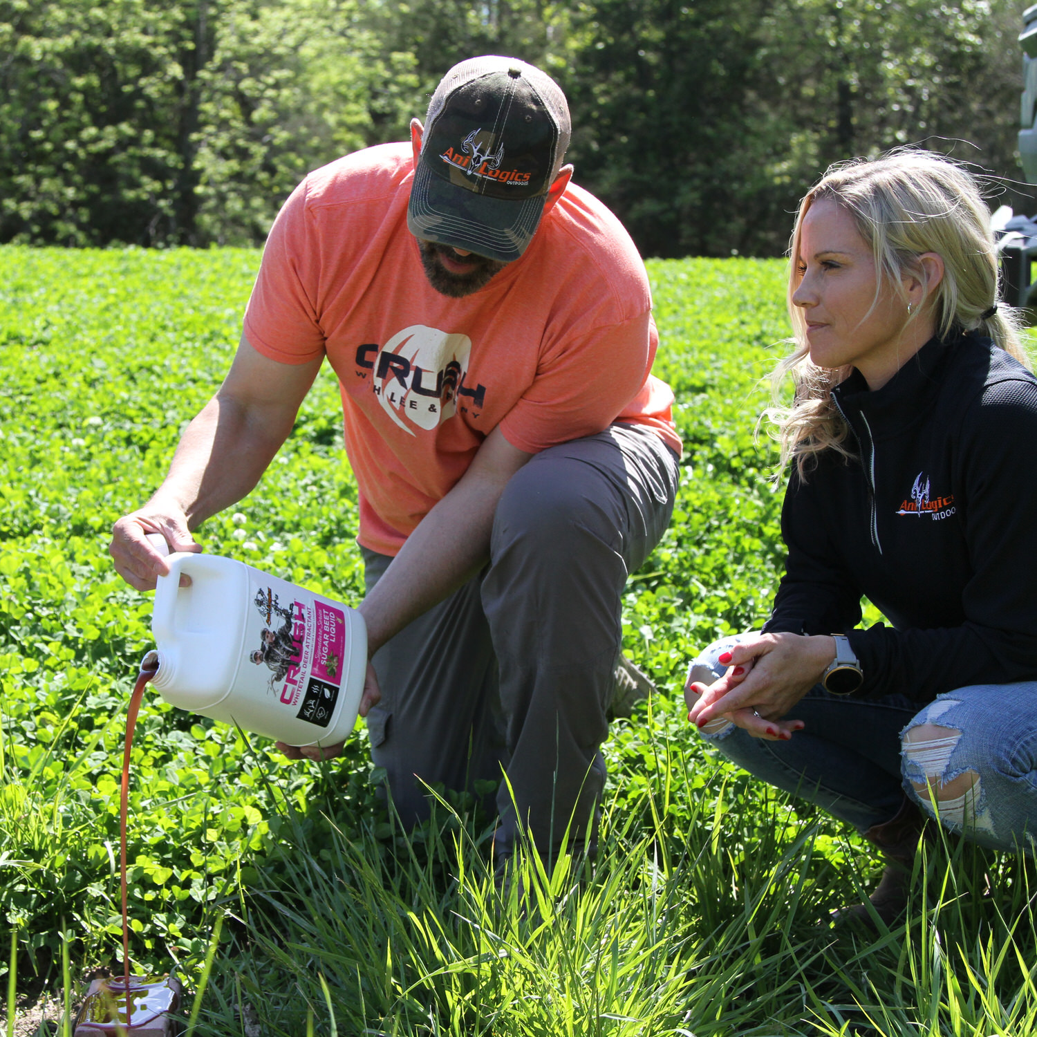 Lee and Tiffany Lakosky pouring CRUSH Sugar Beet Liquid onto the ground