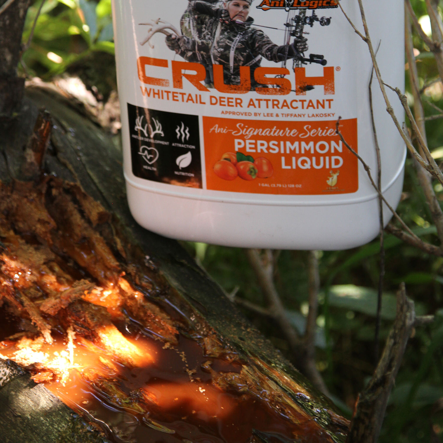 CRUSH Persimmon Liquid poured onto a log