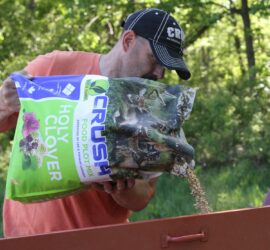 Lee Lakosky pouring out a bag of CRUSH Holy Clover