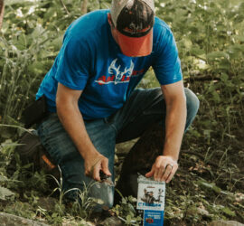 Man placing a CRUSH Wild Berry Brick on the ground