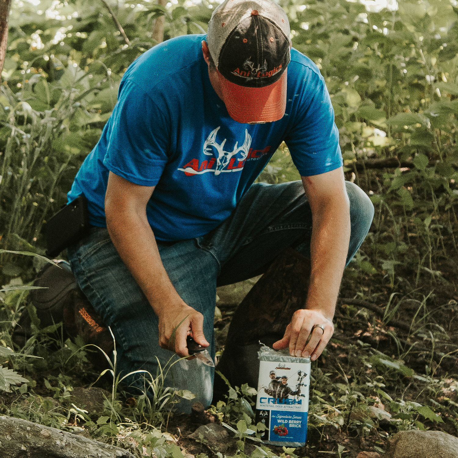 Man placing a CRUSH Wild Berry Brick on the ground