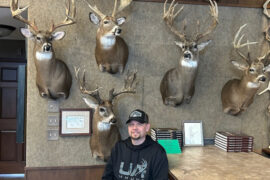 Luke Onstad with his trophy wall