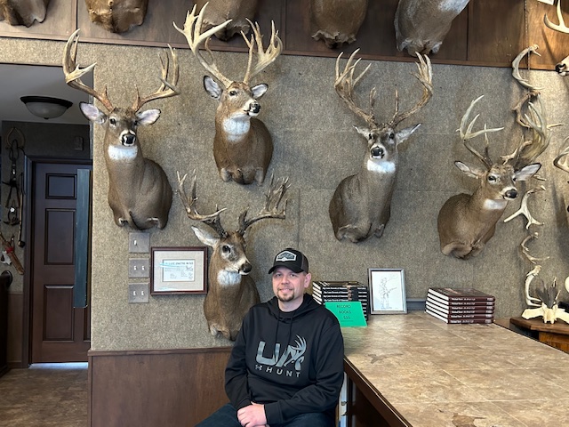 Luke Onstad and his trophy wall