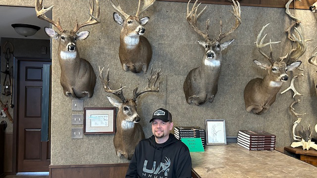 Luke Onstad with his trophy wall